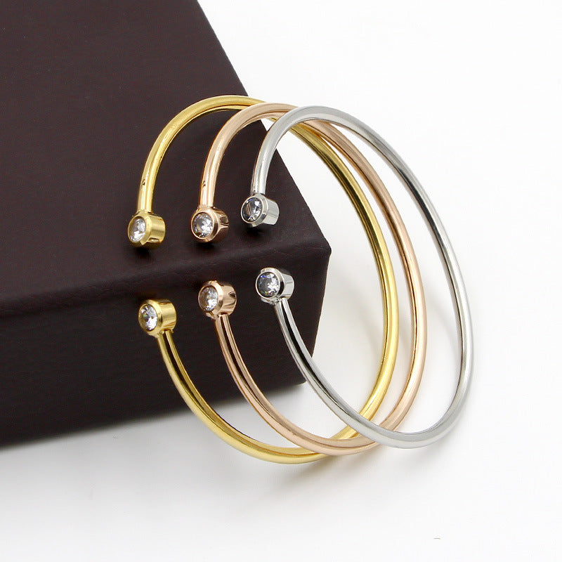 Open Gold Bracelet with Twin Crystals